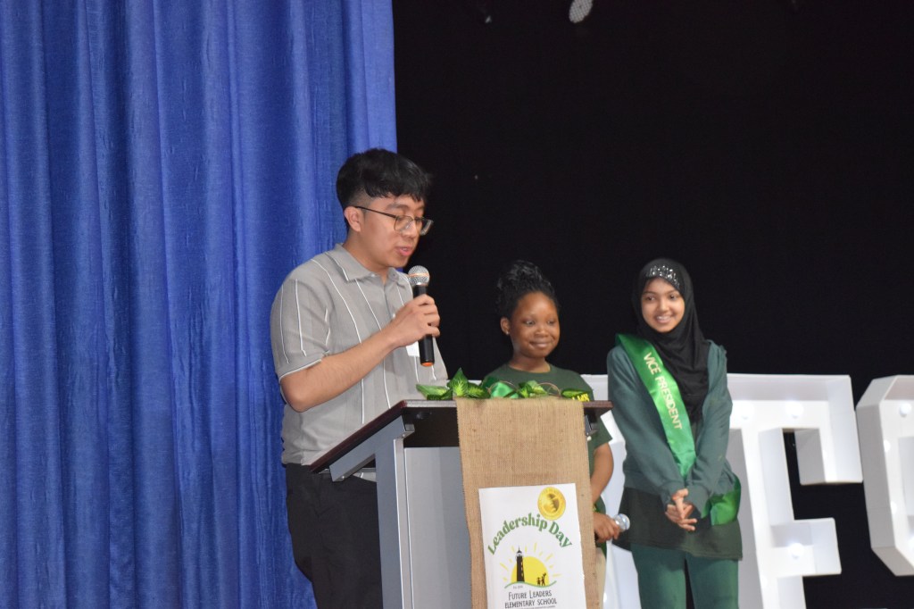 Returning alum Brayan Ramos Vicente is giving his speech.